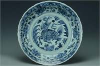 A LARGE MING DYNASTY BLUE AND WHITE BARBED DISH