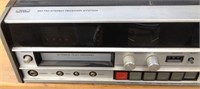 Stereo system with record & 8-track tape players