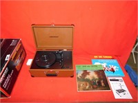 Crosley portable record player and 2 records