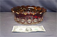 ruby red and clear glass bowl marked NM