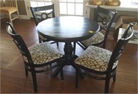 BLACK TABLE AND 4 UPHOLSTED CUSHIONED CHAIRS