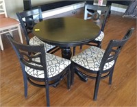 BLACK TABLE AND 4 UPHOLSTERED CUSHIONED CHAIRS