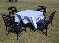 WROUGHT IRON TABLE AND 4 CHAIRS