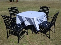 WROUGHT IRON TABLE AND 4 CHAIRS