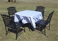 WROUGHT IRON TABLE AND 4 CHAIRS