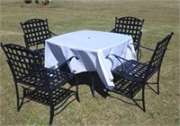 WROUGHT IRON TABLE AND 4 CHAIRS