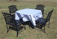 WROUGHT IRON TABLE AND 4 CHAIRS