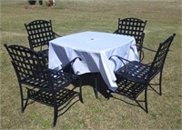 WROUGHT IRON TABLE AND 4 CHAIRS