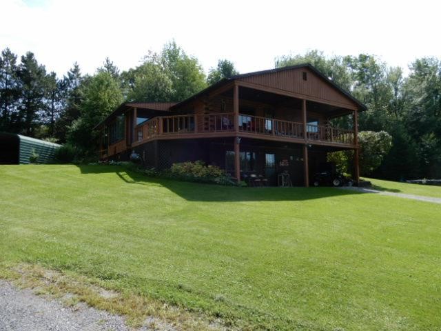 Log Cabin Home W/Pond Setting on 8.32 Acres