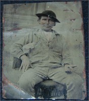 Tintype of a Gold Miner Holding Nuggets