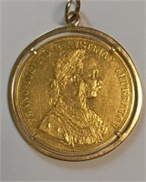 AUSTRIAN GOLD COIN IN 18K GOLD PENDANT FRAME