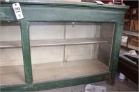 Green display case, wood top, 7'