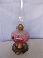 Antique Oil Lamp  with Rose Coloured Bulb