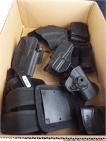 Box of misc. plastic holsters, M&P