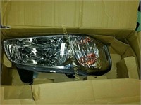 TYC 20 5769 00 Nissan Maxima Passenger Headlight