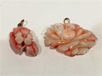 2 CORAL CARVED PENDANTS