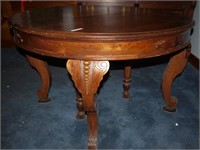 Mahogany Round Dining Table on Carved Cabriole
