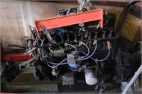 Engine on cherry picker engine stand