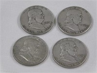 Four Franklin half dollars, 1952 - 1953D - 1962D