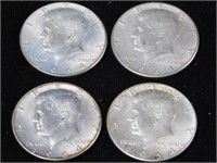 Four Kennedy silver halves, three 1964D - 1964