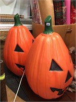 2 plastic molded pumpkins