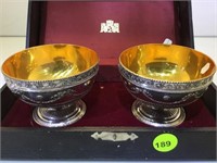 A PAIR OF DECORATIVE METAL CUPS W/CASE