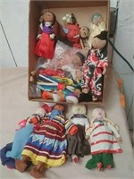 Group of vintage cloth face dolls