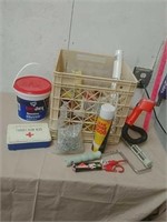 Crate full of spackle painting supplies wood