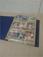 Group of collector baseball cards in binder