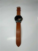 Brown and black watch with flowers