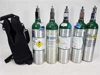 Lot of 5 oxygen tanks with case