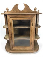 Wall-mounted curio cabinet