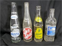 4 vintage pop bottles