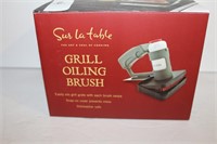 Surlatable grill ouls and brush