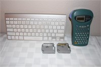 1 Brother label maker w/ white and gold cartrages