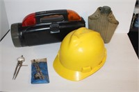 Hard hat, German protractor, flashlight tool kit