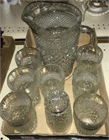 Glass pitcher and matching glasses