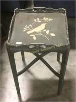 Painted wooden table with a bird design