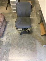 Computer chair and plastic roll mat