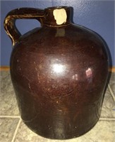 Stoneware jug has chipped