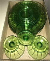 Green glass plates and cups