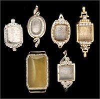 A COLLECTION OF LADIES' GOLD WATCH CASES