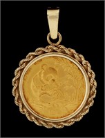 A 1994 GOLD PANDA 10 YUAN COIN PENDANT