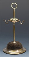 AN ANTIQUE SILVER PLATED HAT PIN STAND