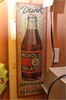 Nichol Kola Sign