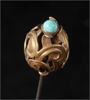 AN ANTIQUE 14K GOLD HAT PIN WITH TURQUOISE