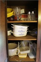 CONTENTS OF CABINET: CORNINGWARE, MEASURING CUPS,