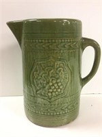 Green stoneware pitcher
