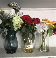 Set Of Plastic and Cloth Flowers In Glass Vases