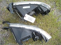 Set Of Headlamps - Unsure But They Appear